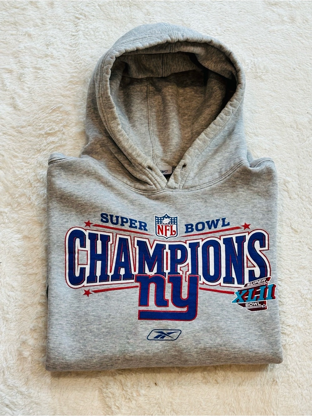 Reebok Gray Hoodie with Blue & Red NFL Champions Graphic